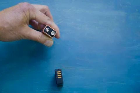 Hand With Battery 写真素材