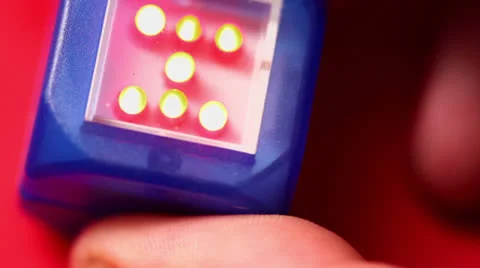 Hand beats by electronic dice in form of toy cube with LED light Stock Footage 22734648