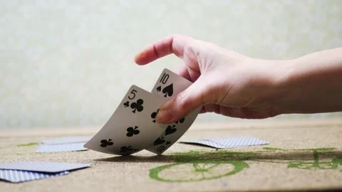Hand beautifully flips the playing card Stock Footage 221195677