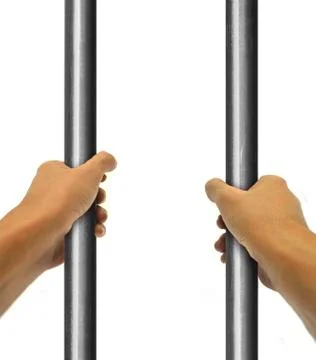 Hand behind bar Stock Photos