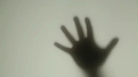 Hand behind glass Stock Footage 14820358
