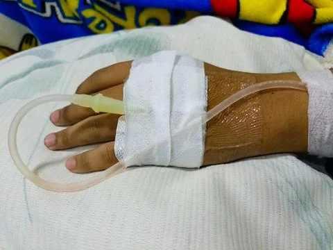 Hand is being infused Stock Photos