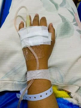 Hand is being infused Stock Photos