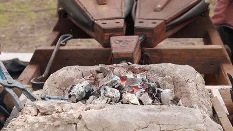 Hand bellows in operation in the smithy. Stock Footage