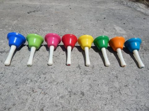 Hand Bells on the Ground Stock Photos