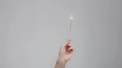 Hand with bengal lights Stock Footage 100064373