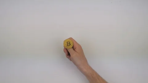 The hand with the bitcoin on a white background Stock Footage 108395788