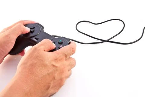 Hand on black game controller isolated on white background Stock Photos