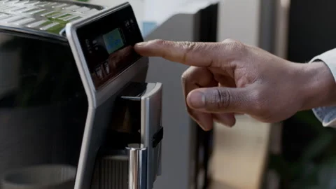 Hand of Black Man Pressing Button on Coffee Machine in Office Stock Footage 302406433