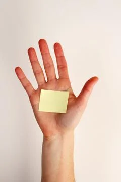 Hand with blank note Foto stock