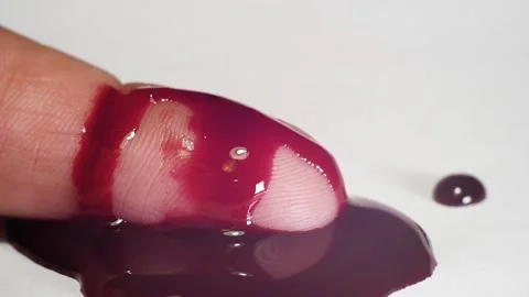 Hand with blood on white background. Stock Footage 99823218