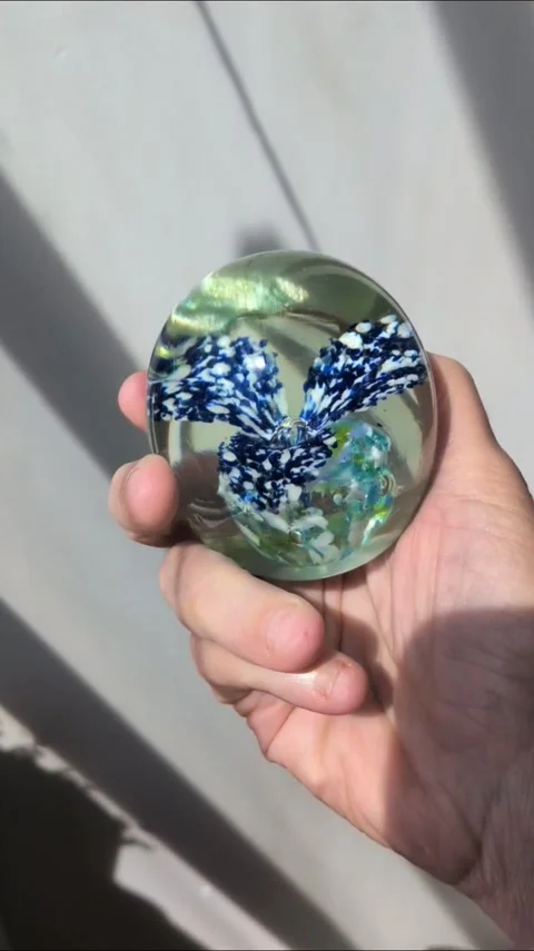 Hand Blown Egg Shaped Paperweight, Controlled Bubbles Floral Paper Weight 動画素材 345372055