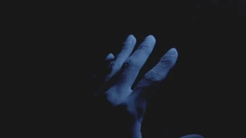 Hand in Blue light Stock Footage 257378390