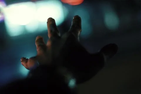 Hand in Bokeh Stock Photos