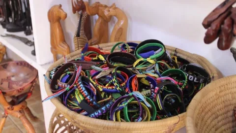 Hand braslets placed in small basket Stock Footage 162974271