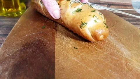 Hand bread cut Stock Footage 82953989