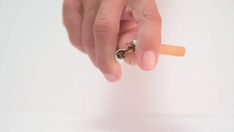 Hand breaking a cigarette for quit smoking concept Stock Footage 335177043