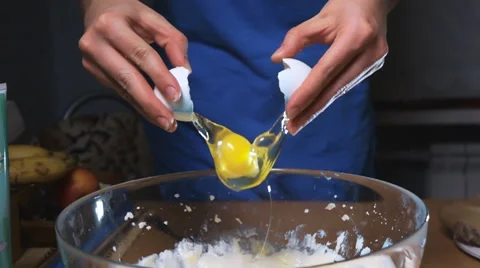 Hand Breaking Egg For Cooking Stock Footage 62527471