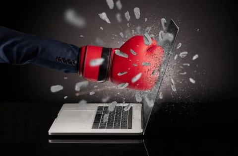 Hand breaks laptop screen Stock Photos