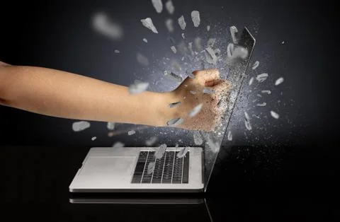 Hand breaks laptop screen 스톡 사진