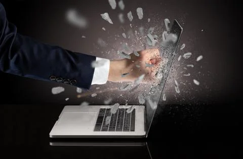 Hand breaks laptop screen 스톡 사진