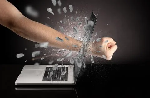 Hand breaks laptop screen Stock Photos