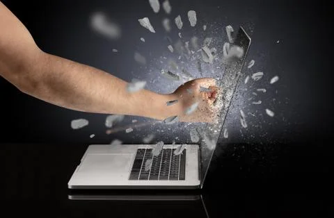 Hand breaks laptop screen Stock Photos