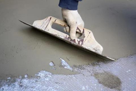 Hand of bricklayer at the work Stock Photos