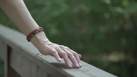 Hand on the bridge railing. Stock Footage 138237396