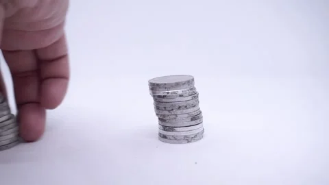 Hand is bring pile of coins. Realistic coins (Indonesian Rupiah). Stock Footage 221960062