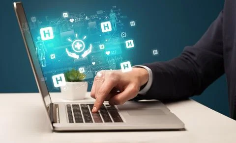 Hand browsing on the internet for medical issues Stock Photos