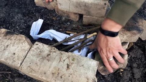 Hand building a grill out of bricks Stock Footage 75533813