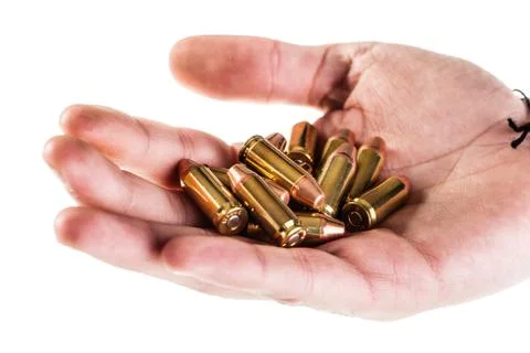 Hand of bullets Stock Photos
