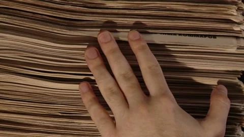 Hand with a bunch of newspaper Stock Footage 88178257