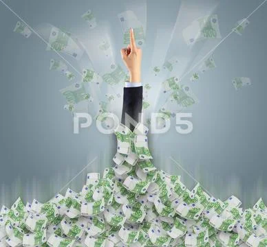 Hand buried in cash pile and trying to get out Stock Photos