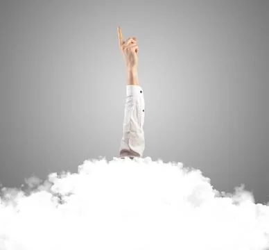 Hand buried into cloud 스톡 사진