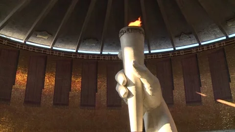 A hand with a burning torch, an eternal flame in memory. Volgograd, Russia Stock Footage 87466424