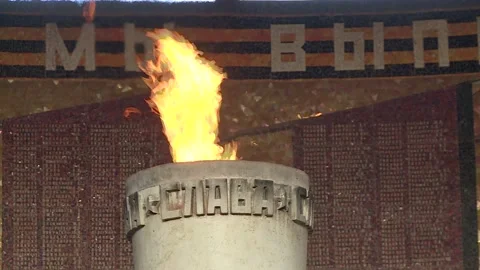 A hand with a burning torch, an eternal flame in memory. Volgograd, Russia Stock Footage 87466442