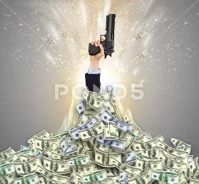 Hand bursting from a money heap Stock Photos