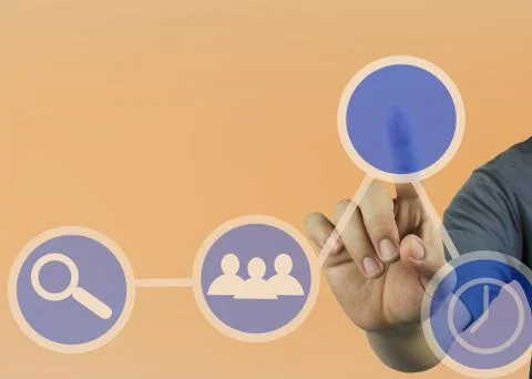 Hand of businessman point to the empty circle in business ideas on orange bac Stock Photos
