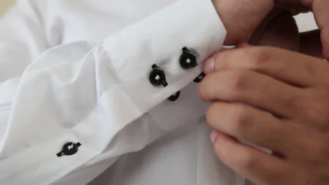 Hand Buttoning White Shirt Cuff Close Up Stock Footage 344913352