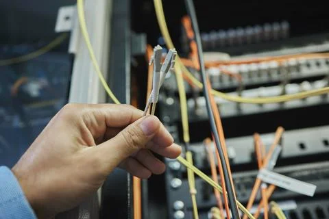 Hand, cable and server room for internet infrastructure and lights of computer 스톡 사진