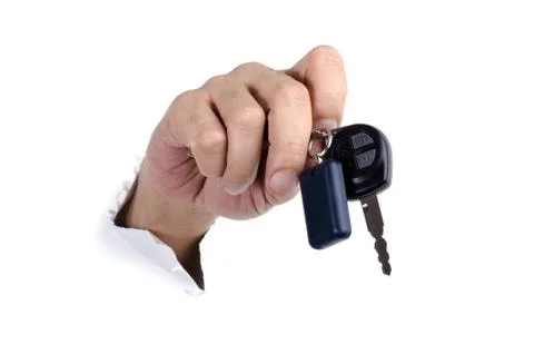 Hand with car key Stock Photos