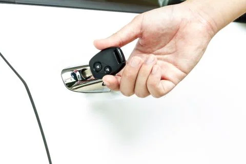 Hand on car key Stock Photos