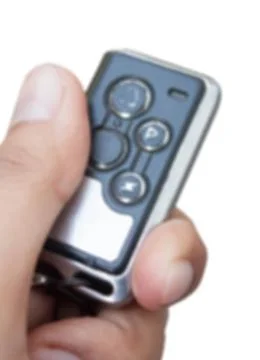 Hand car remote blur isolate background Stock Photos