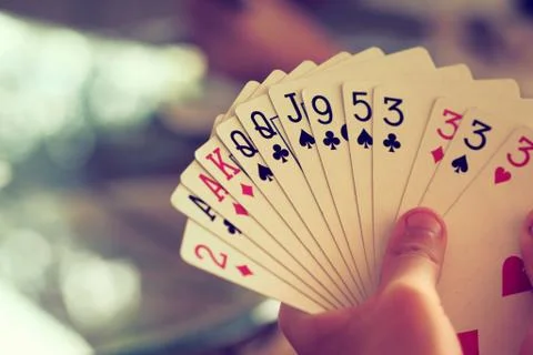 Hand with cards Stock Photos