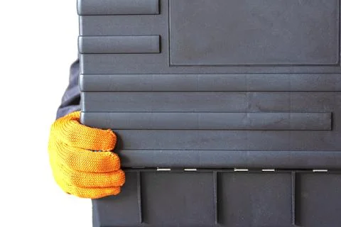 Hand with a case. gloves, tool box, person Stock Photos