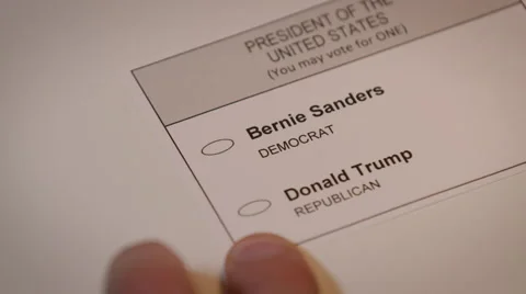 Hand casting a ballot paper to Bernie Sanders Stock Footage 64452823