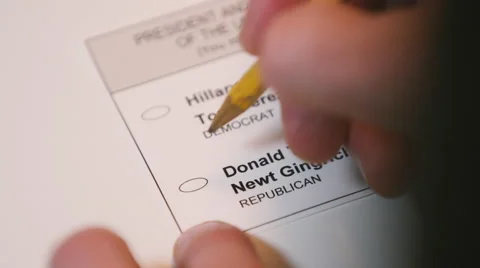 Hand casting a ballot paper to Donald Trump Stock Footage 64455330