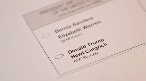 Hand casting a ballot paper to Donald Trump 스톡 동영상 64455344